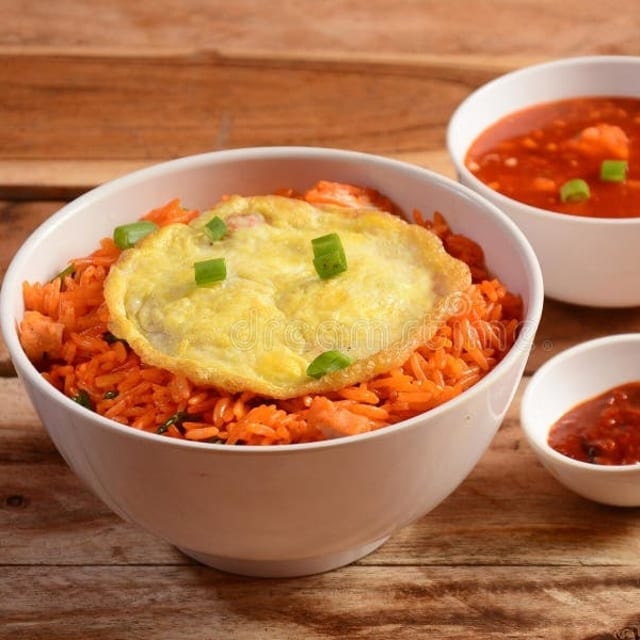 Egg Schezwan Triple Fried Rice.