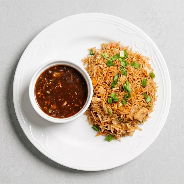 Veg Schezwan Triple Fried Rice.