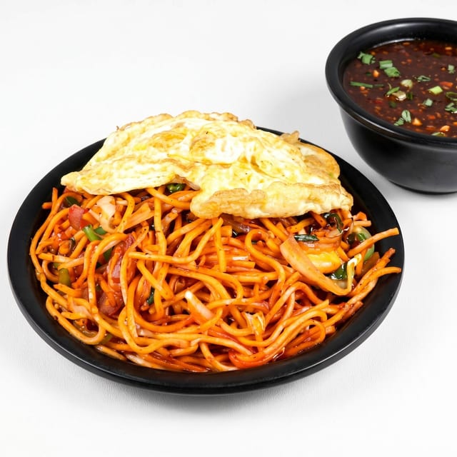 Chicken Schezwan Triple Noodles.
